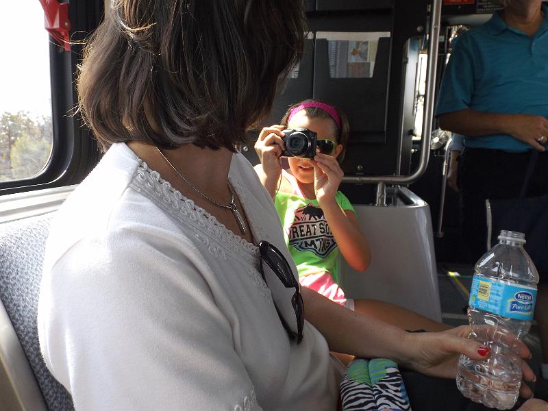 DSCF0094.JPG - Grand Canyon - Kayla riding the bus, taking Mom's picture