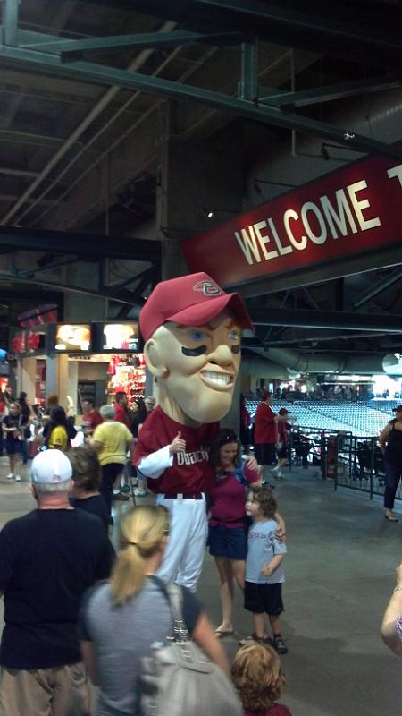 2013-07-07_12-15-42_783.jpg - Mascot. No idea who it is supposed to be, but 4 of these giants had a race between innings.