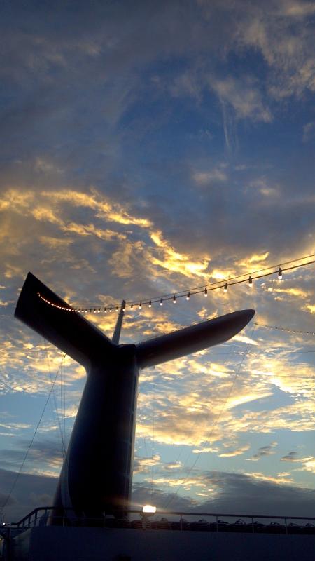 2013-01-22_18-29-03_241.jpg - Carnival Glory - evening shot of smokestack