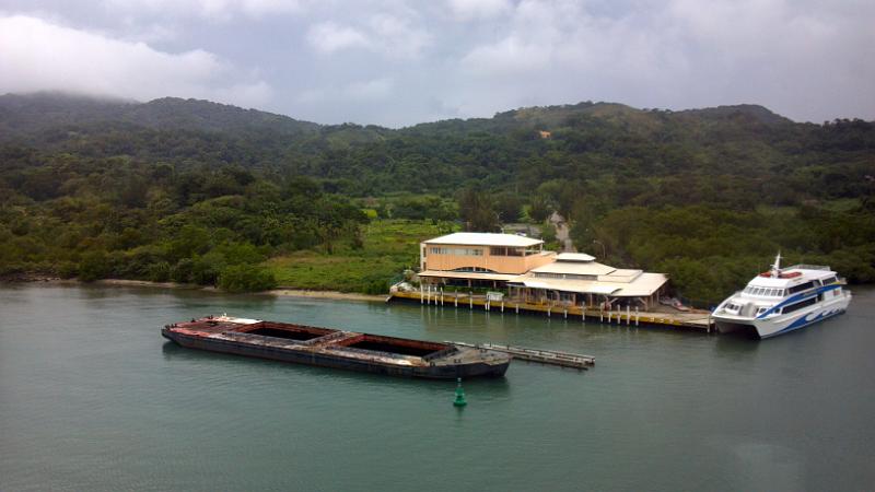 2013-01-24_15-09-35_472.jpg - Roatan Island, Honduras - Mahogany Bay.  This barge ran aground and they just leave it there.