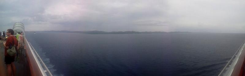 20130124_152749.jpg - Roatan Island, Honduras - Mahogany Bay.  Panoramic view, from one ship railing to the other, of Roatan.