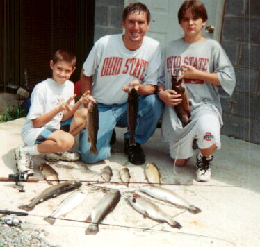 The guys are holding the best of their catch!